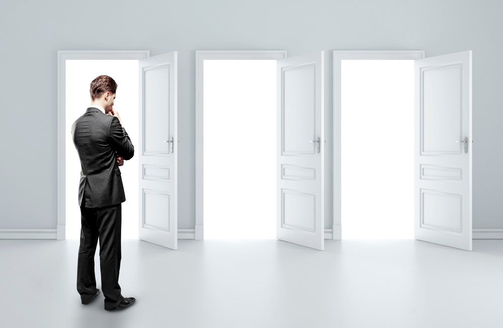 man choosing of three opened doors