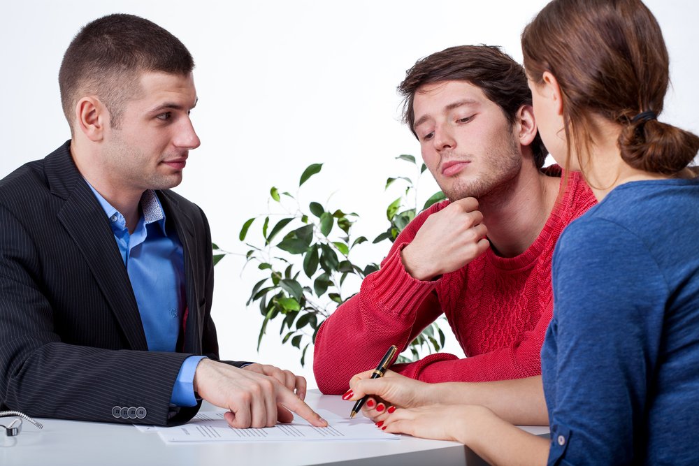 A couple on a business advisory meeting with a specialist